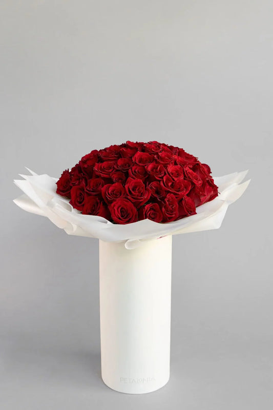 72 Preserved Red Roses in a Signature Petalonia Vase and Tote - Black Petals