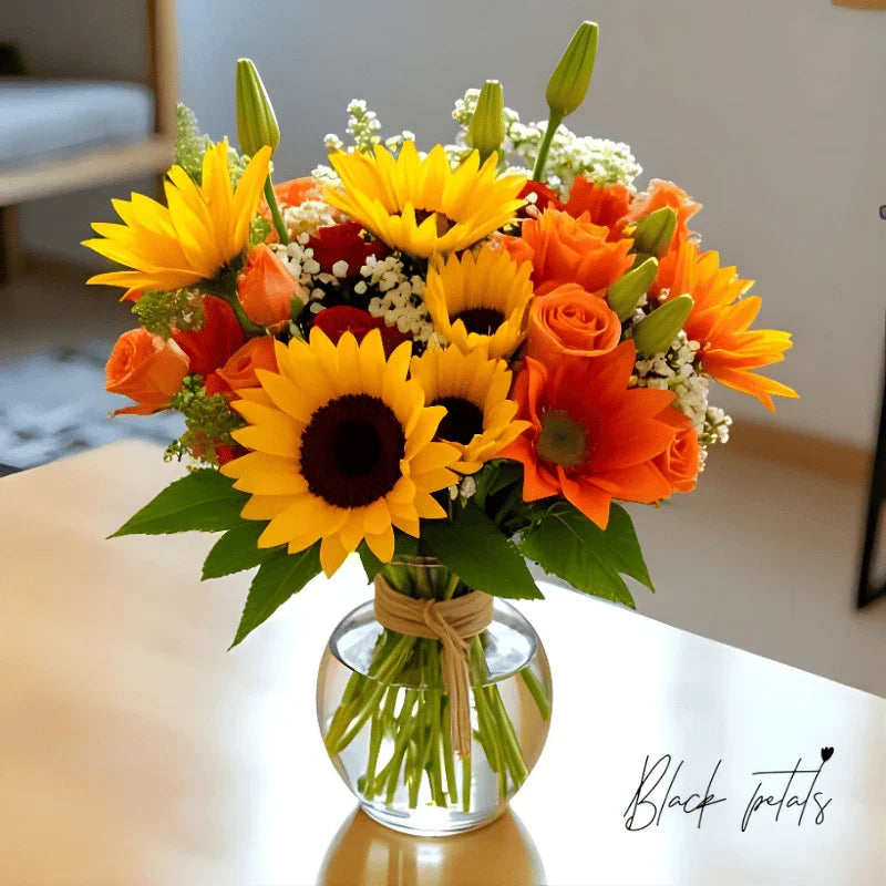 Radiant Harvest Glow bouquet with sunflowers and orange roses NYC