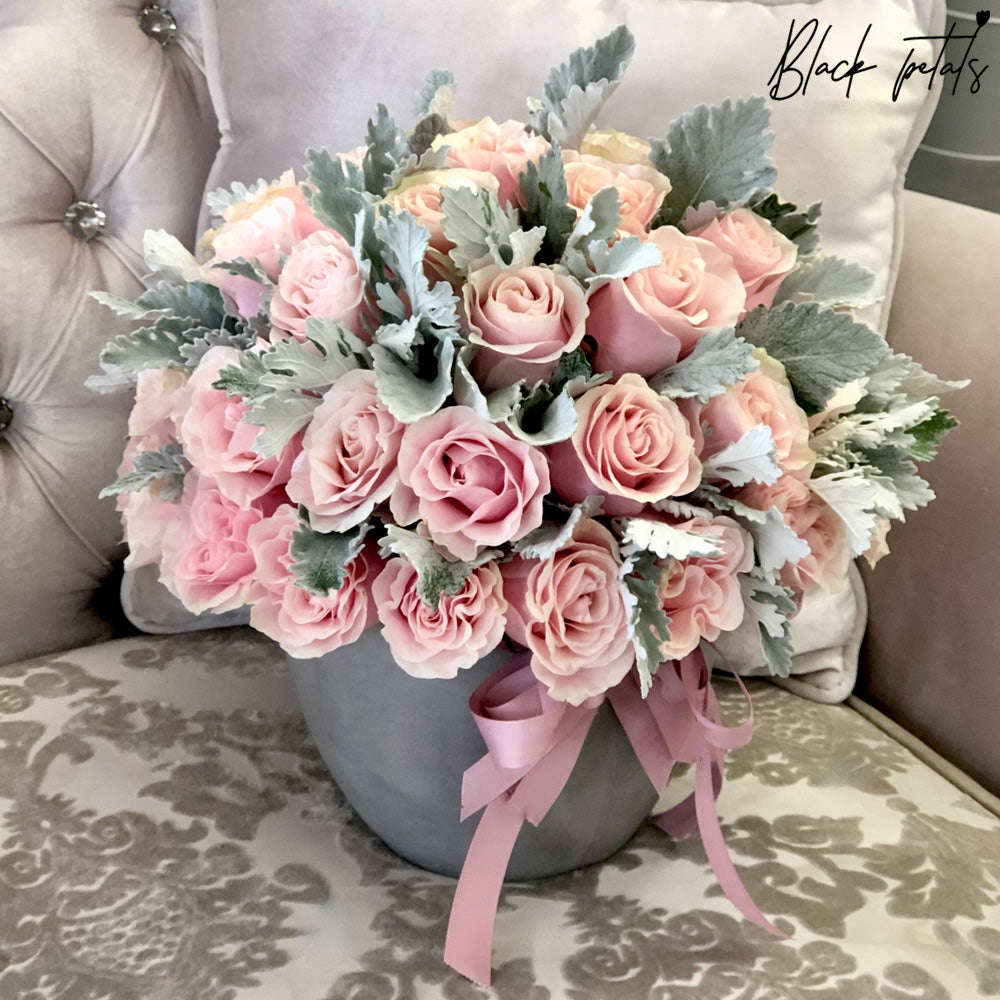 Pink Mondial Roses In A Ceramic Pot