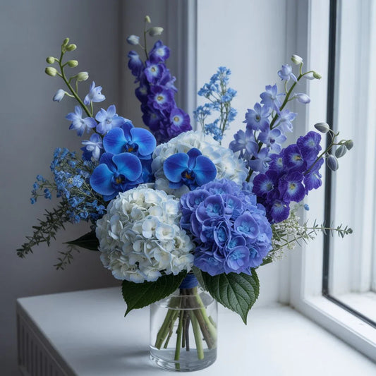 Blue hydrangea and delphinium bouquet symbolizing peace and serenity – Black Petals NYC