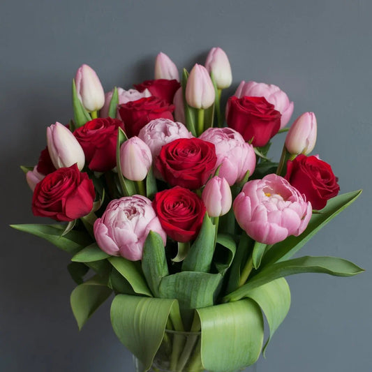 Romantic bouquet of red roses, pink tulips, and peonies – Black Petals NYC