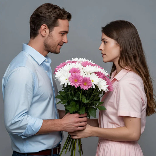 A man holding a romantic flower bouquet behind his back, preparing to surprise a smiling woman—capturing the emotion of giving flowers with intention