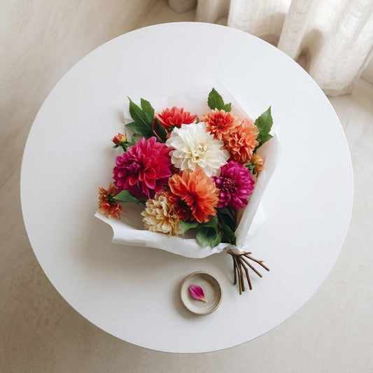 Colorful dahlia bouquet with pink, coral, orange and white dahlias
