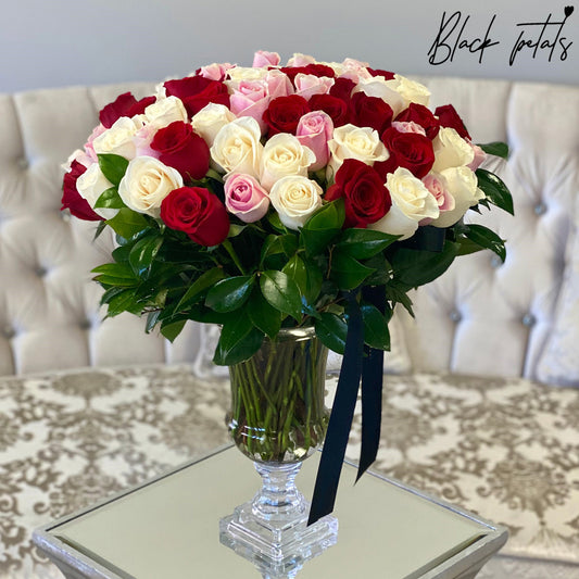 75 BP Multicolor Roses In A Glass Vase