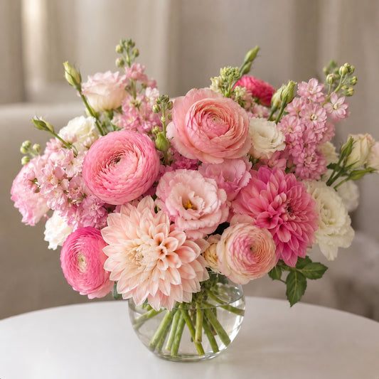 Pink dahlia floral arrangement with ranunculus, blush flowers and white blooms