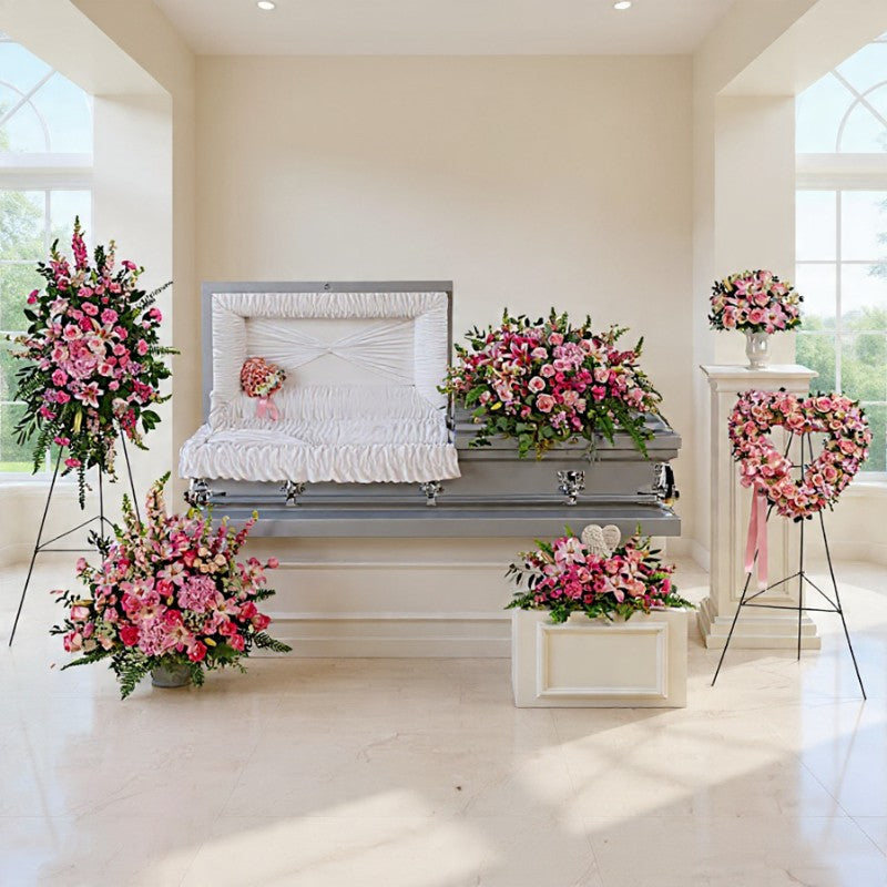 Forever in Our Hearts sympathy flowers with pink roses and lilies for funeral and memorial services