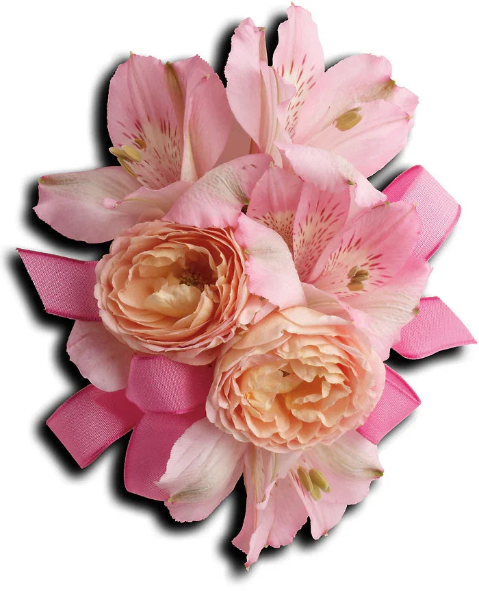 Pink and peach floral corsage with ribbon, featuring roses and delicate petals