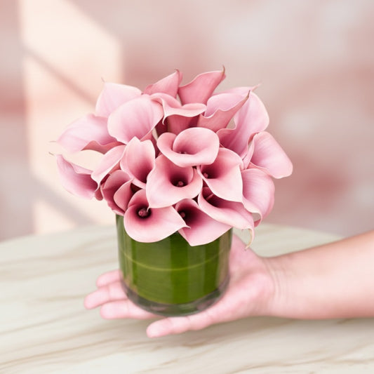 Calla Lilly Flowers in Small Cylinder Vase