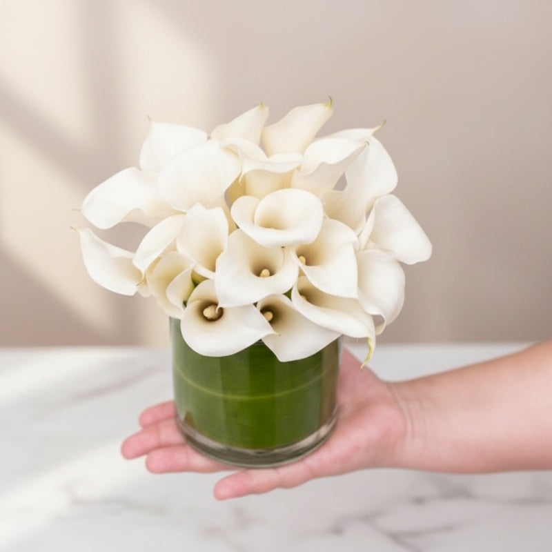 Calla Lilly Flowers in Small Cylinder Vase