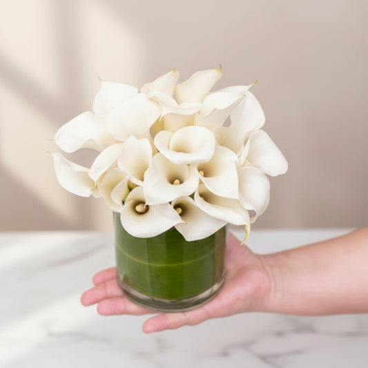 Calla Lilly Flowers in Small Cylinder Vase