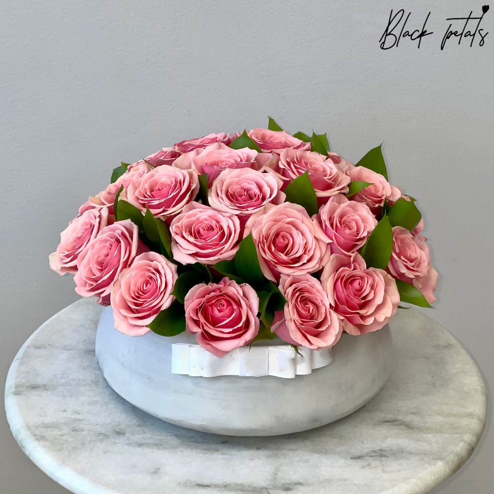 Geraldine Roses In A Ceramic Vase