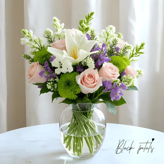 Velvet Tranquility bouquet with white lilies and blush roses NYC