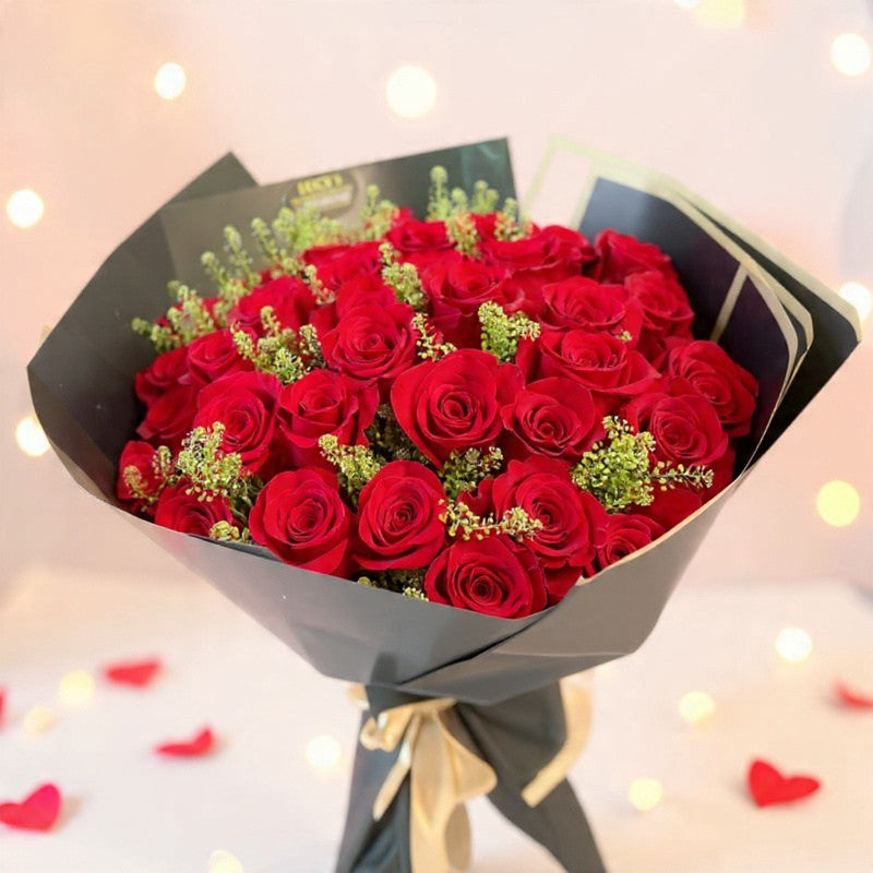 Classic red rose bouquet wrapped in black paper