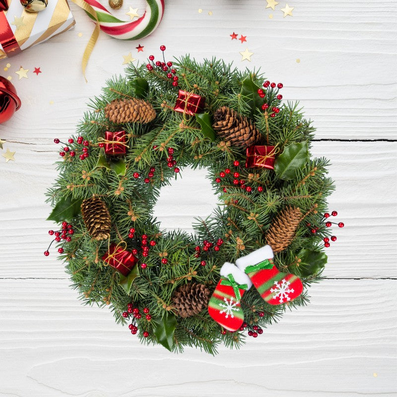 Merry Mittens Christmas Wreath with pinecones, red berries, mini gift boxes, and festive mitten ornaments for holiday décor.