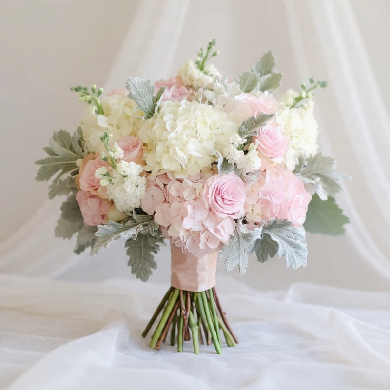 Ethereal blush bridal bouquet with soft pink and white flowers