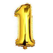 Golden foil balloon shaped like the number one on white background